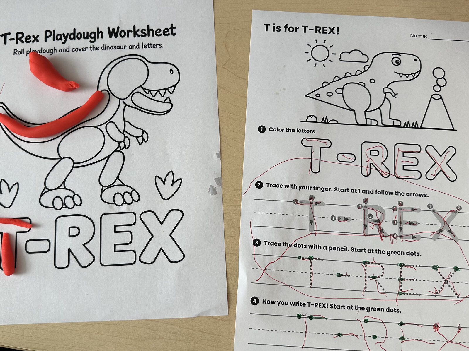 An early-literacy worksheet themed around dinosaurs.